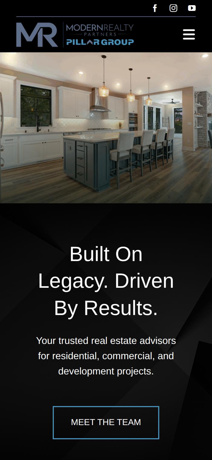 The live Pillar Group website on a phone