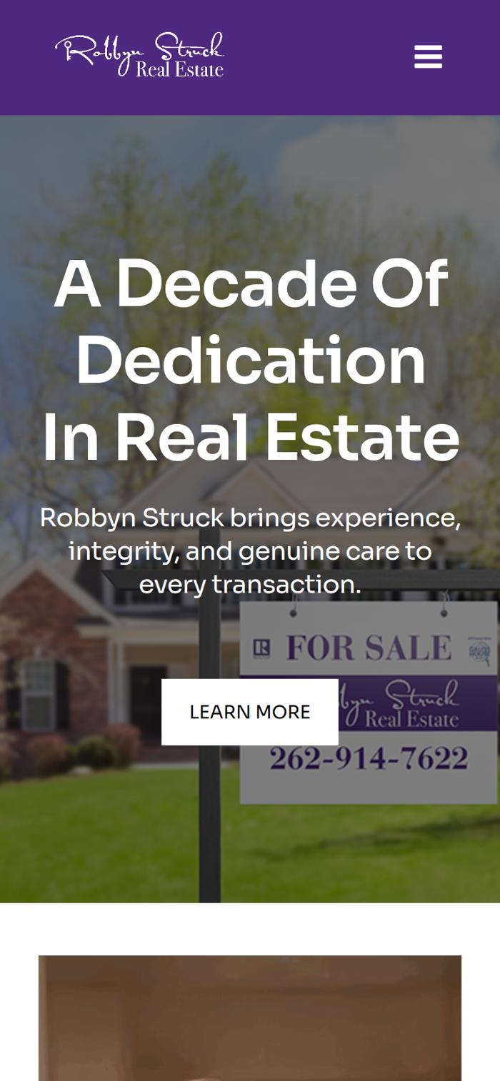 The live Robbyn Struck Real Estate website on a phone