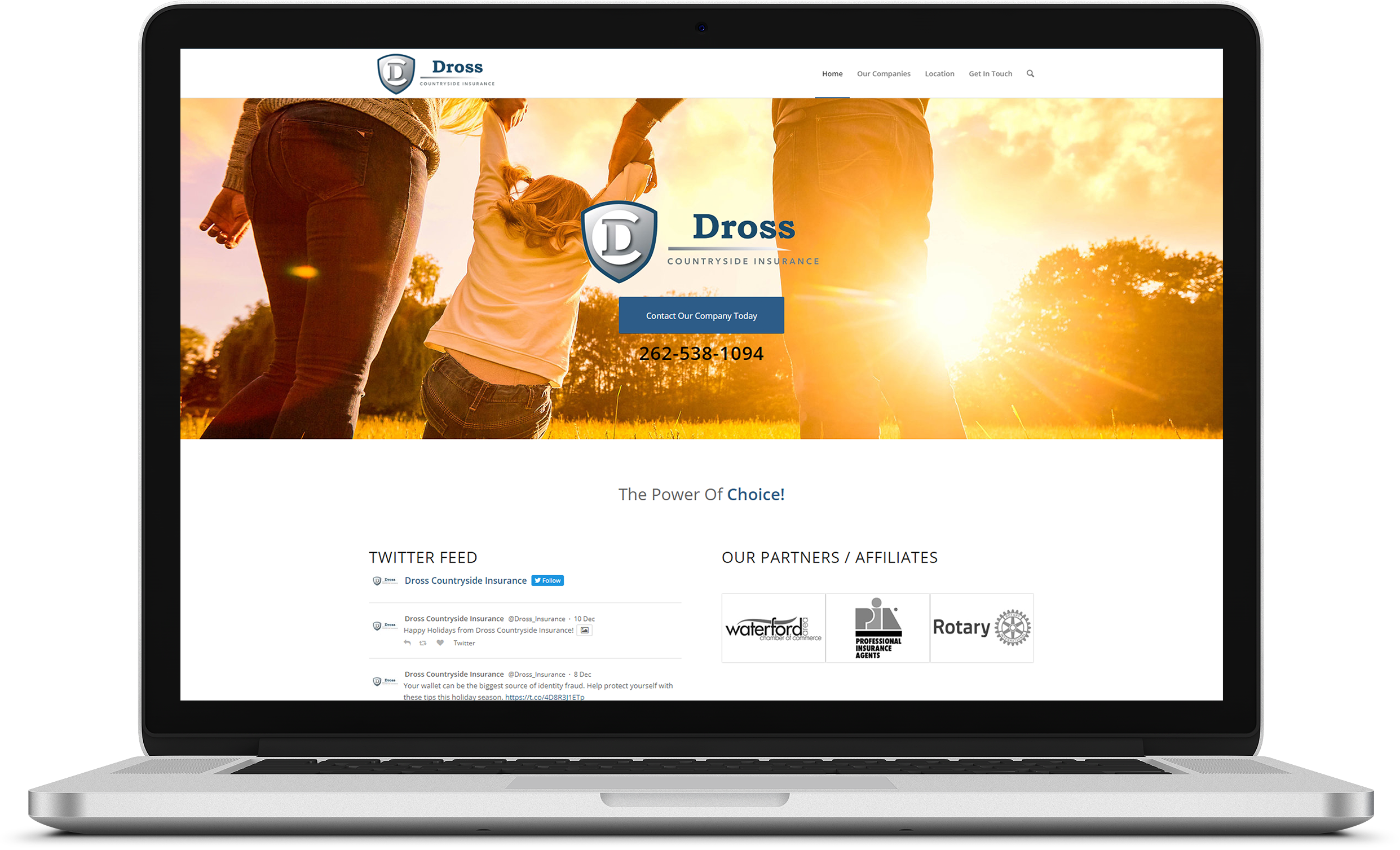 WordPress website design for Merton insurance broker on laptop